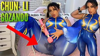 Super-sexy costume play chick clothed as Chun Li from street fighter toying with her htachi electro-hitachi nutting and dousing her underpants and trousers ahegao